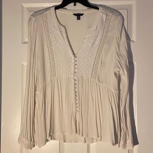 Cream long sleeve peplum top!